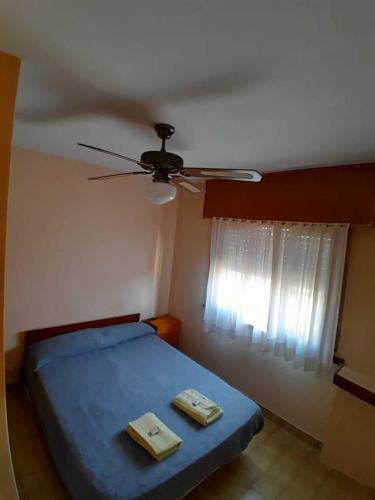 Ένα ή περισσότερα κρεβάτια σε δωμάτιο στο Hotel New SAN MARCOS