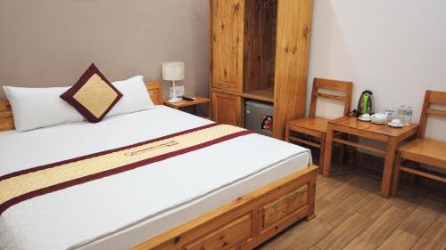 Cama o camas de una habitación en Quy Nhơn Center