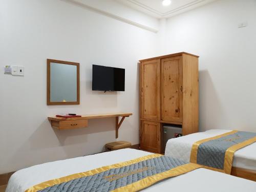 Cama o camas de una habitación en Quy Nhơn Center