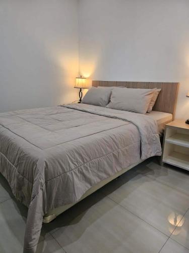 Ένα ή περισσότερα κρεβάτια σε δωμάτιο στο Atma Karsa House