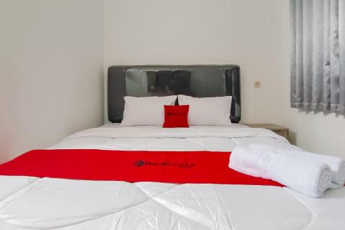 Кровать или кровати в номере RedDoorz Syariah near RSUD Kajen Pekalongan