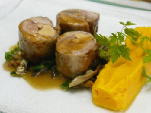 a plate of food with mushrooms and sauce on it at Hostellerie d'Héloïse Logis in Cluny