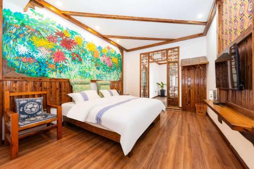 Postel nebo postele na pokoji v ubytování Hotel California Zhangjiajie