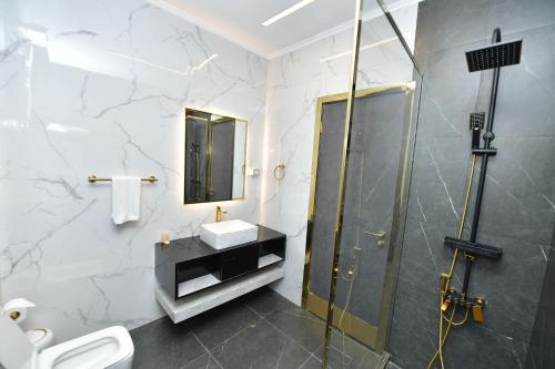 Koupelna v ubytování Palazzo hotel