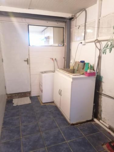 Kuchyň nebo kuchyňský kout v ubytování La casa y el árbol