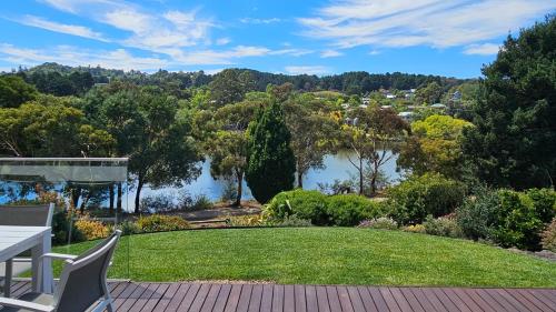 a house with a view of a lake at Province Lake House in Daylesford