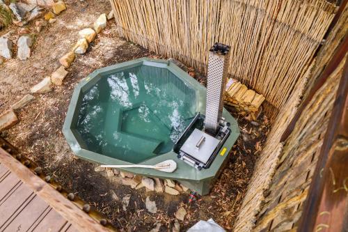 an overhead view of a swimmingificialificialificialificialificialificialificialificialificialificial at Otium Oasis Glamping & Camping in Hartebeest Rivier