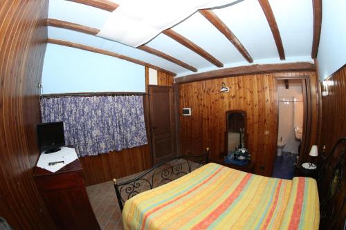 Cama o camas de una habitación en Agriturismo Monte Due Torri