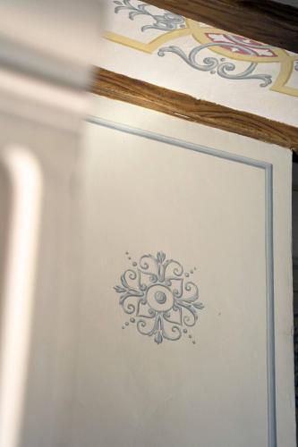 a drawing of a mandala on a wall at Mandarina Room with incredible view in Alzira