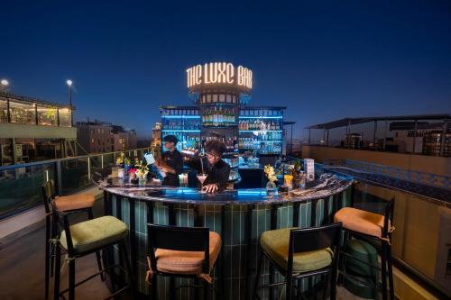 Nápoje v ubytování Le Premier Hotel & Rooftop Bar