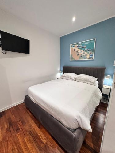 En eller flere senge i et værelse på Dimora PugliaMí