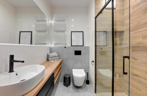 Koupelna v ubytování Apartament Park Centrum