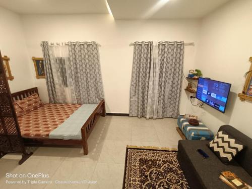 Μια τηλεόραση ή/και κέντρο ψυχαγωγίας στο White Lily home away from home