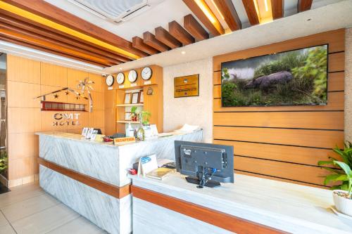 an office with a counter with a computer on it at Chitwan Midtown Hotel in Bharatpur