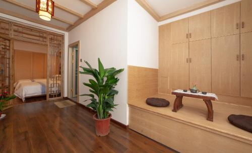 Cama o camas de una habitación en Hotel California Zhangjiajie