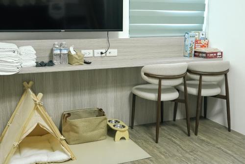 TV a/nebo společenská místnost v ubytování Yukwanhai Hostel