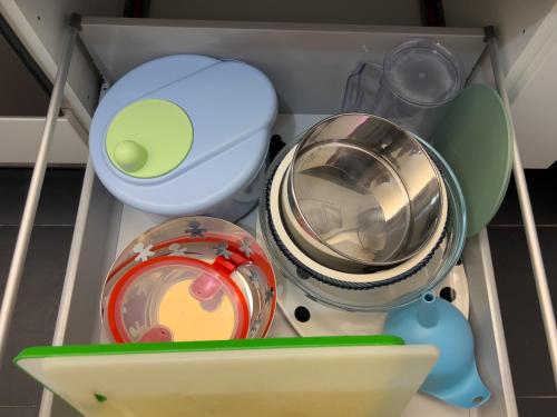 a drawer filled with dishes and a washing machine at Appartamento Principe in Monterosso al Mare