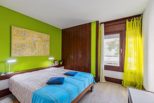 Postel nebo postele na pokoji v ubytování Tróia Dreams