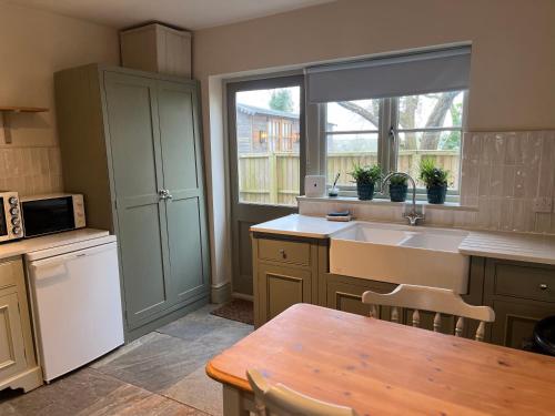 Køkken eller tekøkken på Elmcroft Holiday Annex