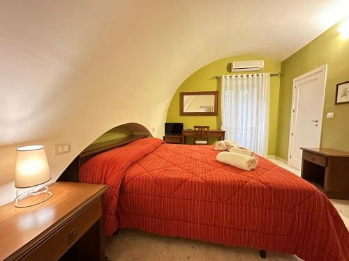 Posteľ alebo postele v izbe v ubytovaní Historic B&B Apartments Home