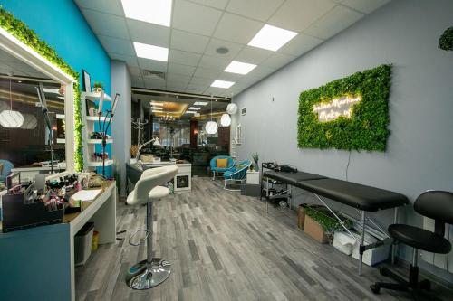 an office with a salon with a green wall at Iceberg Apartment 50 in Borovets