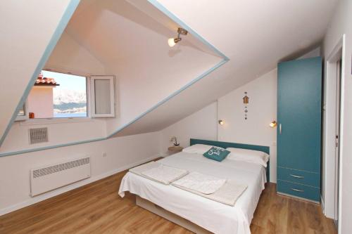 Postel nebo postele na pokoji v ubytování Apartments Silvija Cubranic