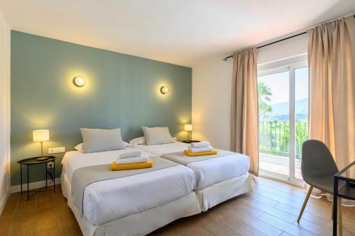 Postel nebo postele na pokoji v ubytování Bandama Golf Hotel by airnest