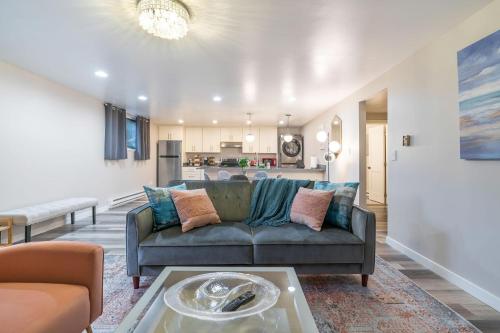 a living room with a couch and a table at Perch - Queen Ann Flat in Seattle