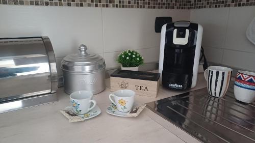 Kemudahan buat kopi dan teh di NSM Casa di Fulmine attico con box privato