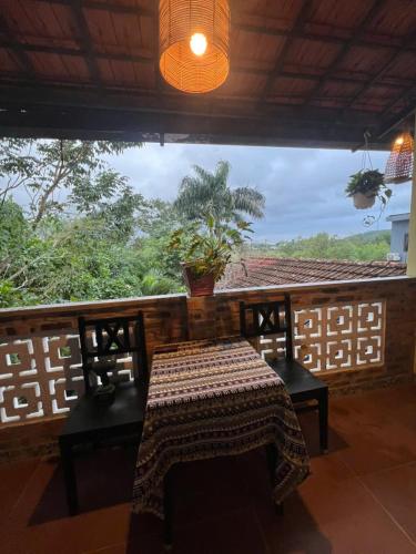 a table and chairs on a balcony with a view at mehome in Cư Chinh