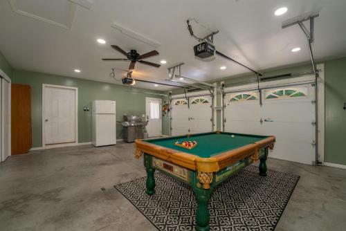 a garage with a pool table in a room at Peace of Heaven in Connestee in Brevard