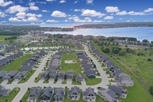 an aerial view of a resort with the water at Bayview Sunset Escape at the Lake in Arnolds Park