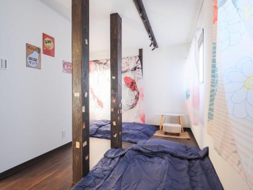 a bedroom with a bunk bed in it at mori HOUSE-vacation rental in Tokyo