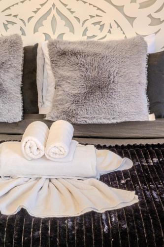 a group of towels sitting on top of a grill at Luxury Villa with Pool, Garden & Gated Security in Marrakesh