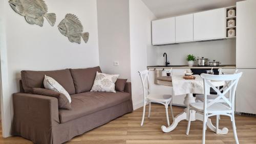 Posezení v ubytování RoofTop Anzio - a 100m dalla spiaggia con vista a 360