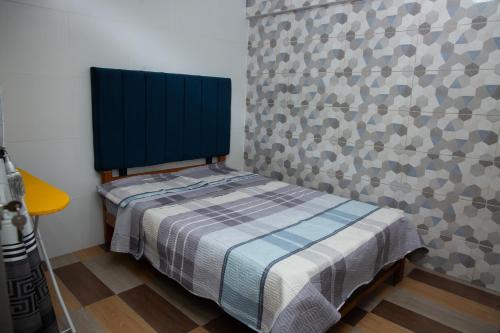 Ένα ή περισσότερα κρεβάτια σε δωμάτιο στο Apartamento La Merced