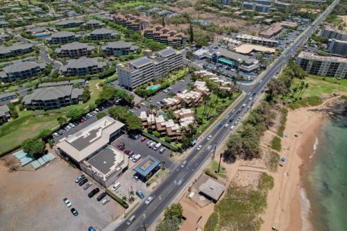 an aerial view of a city with a beach and buildings at Kamaole Beach Club B107 in Kihei