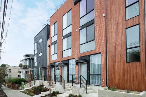 an exterior view of a brick building at Perch - Marion Manor 16 in Seattle