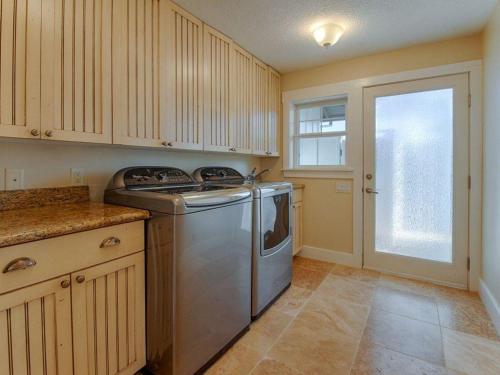 a kitchen with a stainless steel stove and a window at Hale Aulani in Princeville