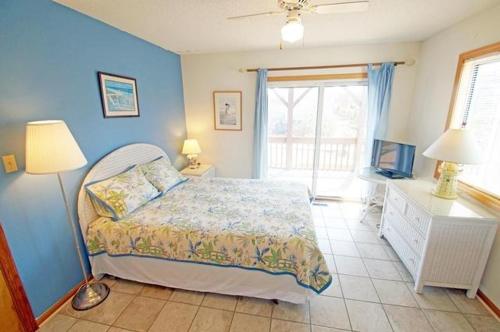 Postel nebo postele na pokoji v ubytování OS602- Dakota Blue Jay