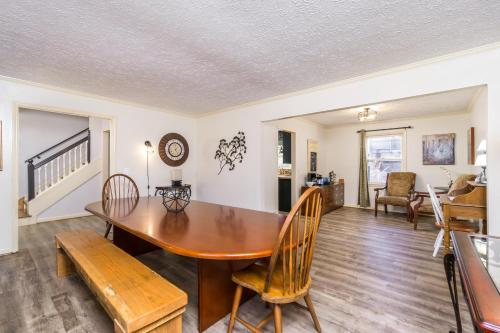 a dining room with a table and chairs at Downtown Family Retreat - 5 Beds & 3.5 Baths in Dahlonega