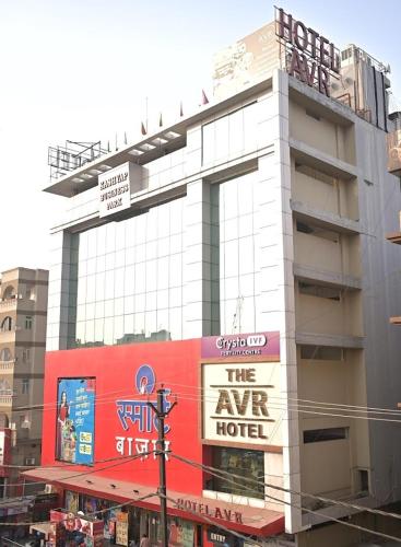 a building with a sign on the air hotel at The AVR Hotels & Banquets in Patna