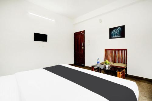 ムンナルにあるHotel O Stay Maxのギャラリーの写真