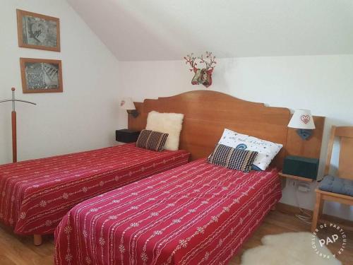 Katil atau katil-katil dalam bilik di Appartement Nez-à-nez à Albiez