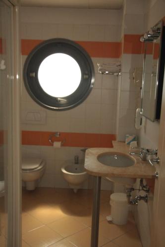 Koupelna v ubytování Hotel Medea