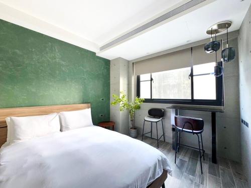 Katil atau katil-katil dalam bilik di Guangfa Apartment