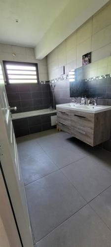 Ένα ή περισσότερα κρεβάτια σε δωμάτιο στο Chambre privée dans maison