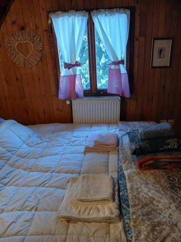 Postel nebo postele na pokoji v ubytování Planinska kucica Srce