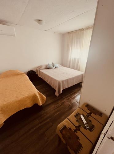 Ένα ή περισσότερα κρεβάτια σε δωμάτιο στο Casa Natural Mystic