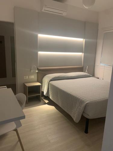 Hotel Maximにあるベッド